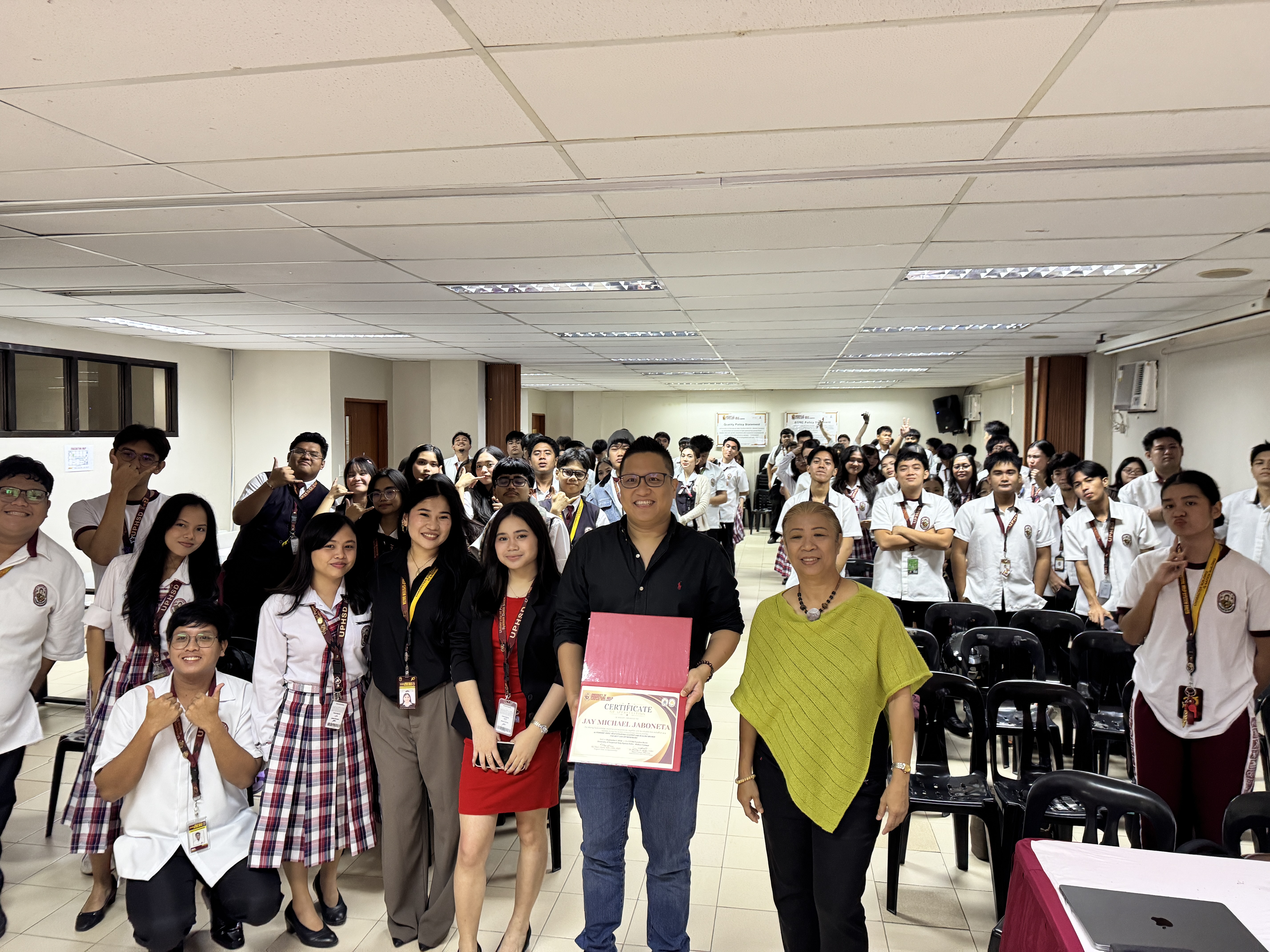 Jay Jaboneta with UPHSD Molino students and faculty after the AI video production workshop